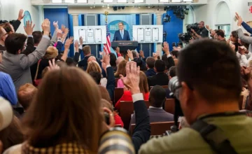 Treasury Secretary Scott Bessent at a White House briefing | Body: A child placing money into a savings bank