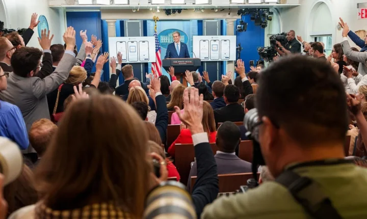 Treasury Secretary Scott Bessent at a White House briefing | Body: A child placing money into a savings bank